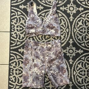 Jessica Simpson purple snakeskin workout set